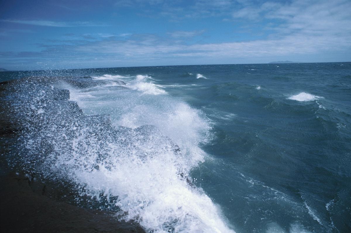 Ocean wave crashing closeup