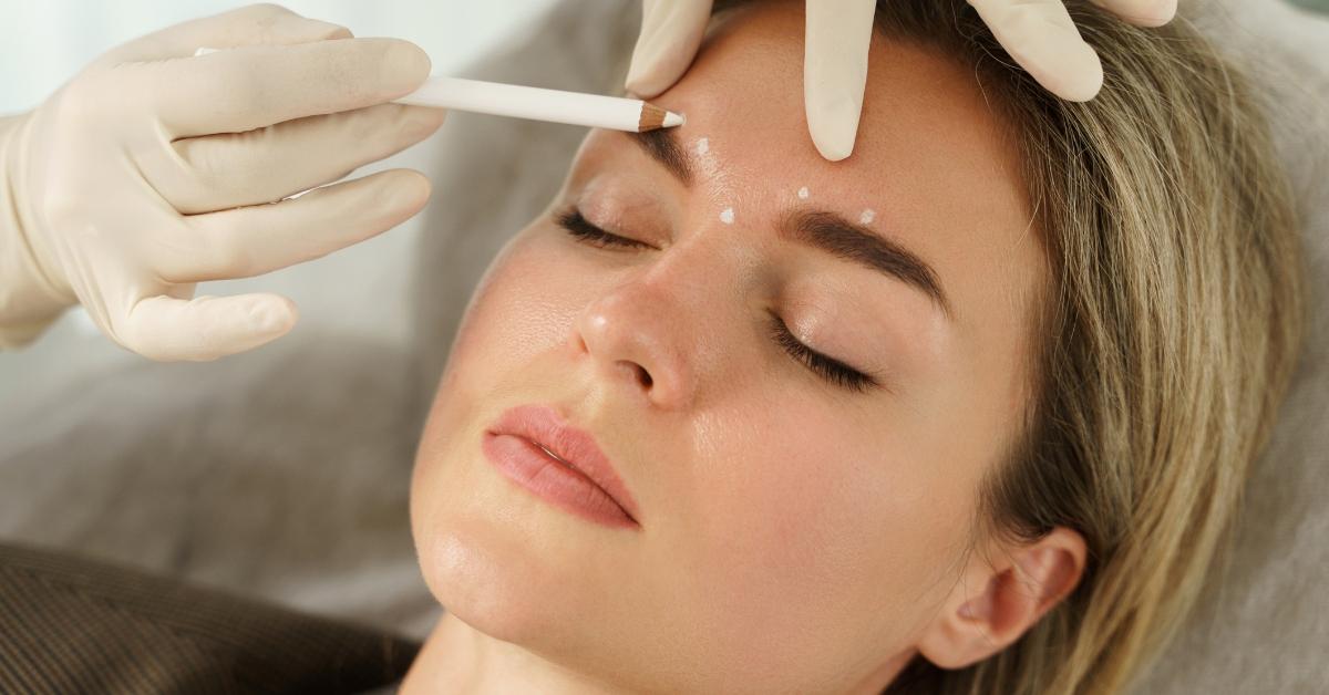 A woman getting Botox injections.
