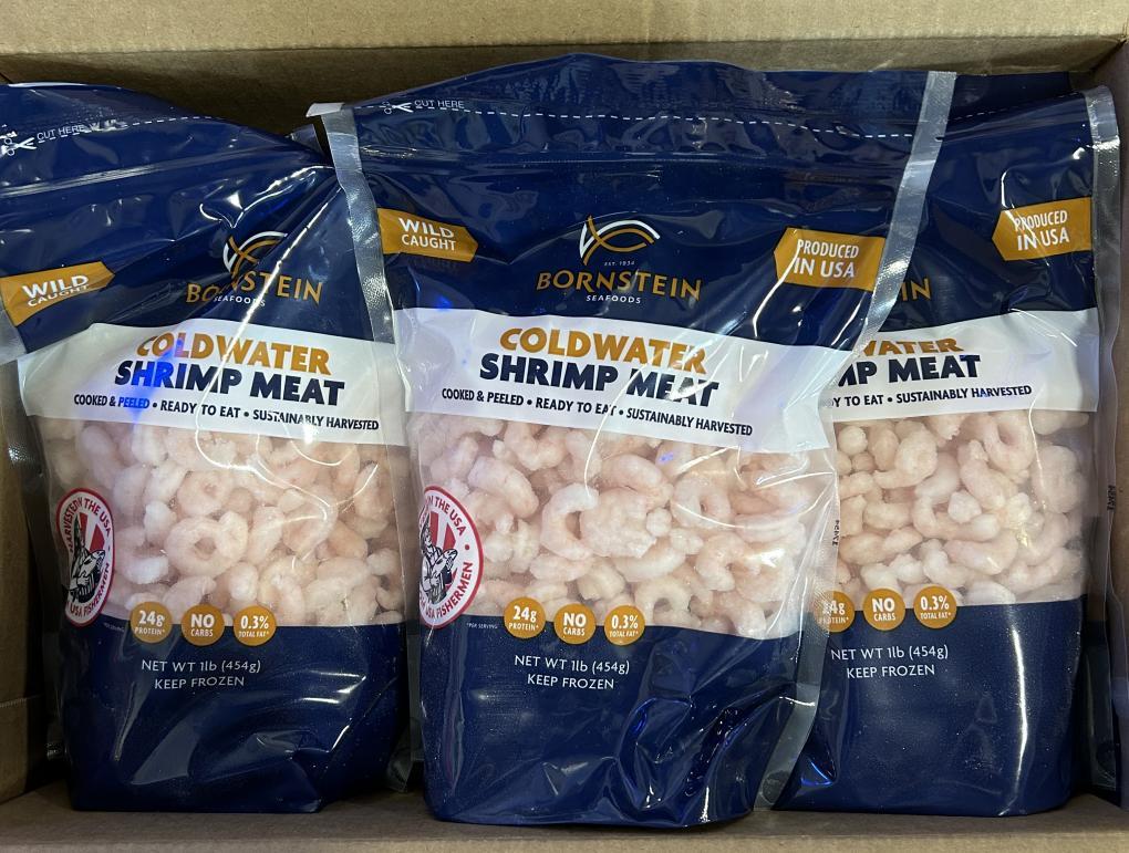 Three packages of shrimp are pictured after being recalled.