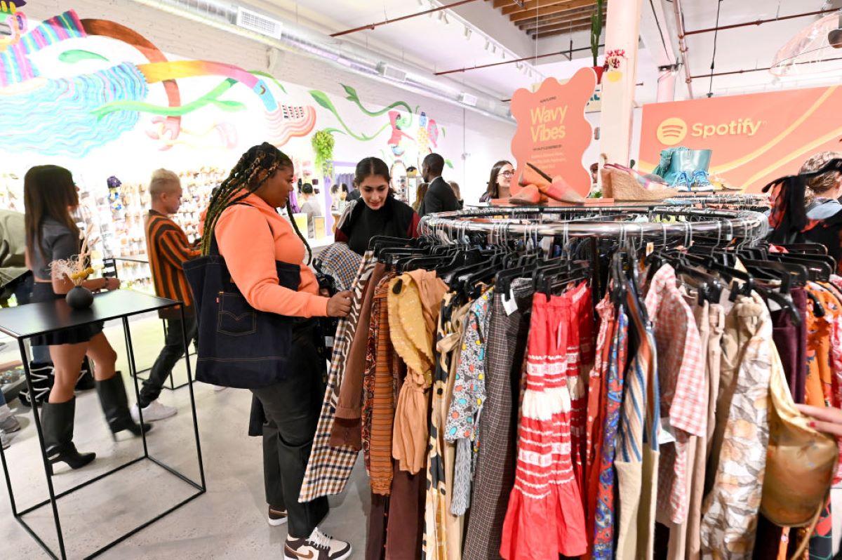 Women shopping at a Spotify thrift store event