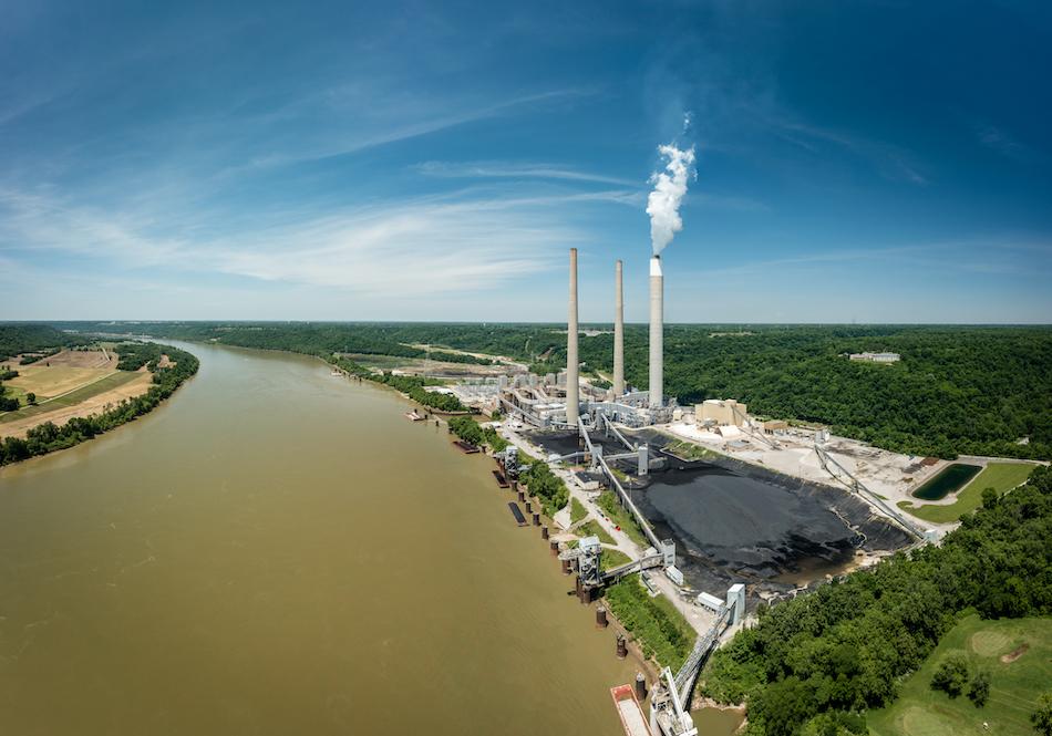 A coal-powered plant on a brown Ohio River